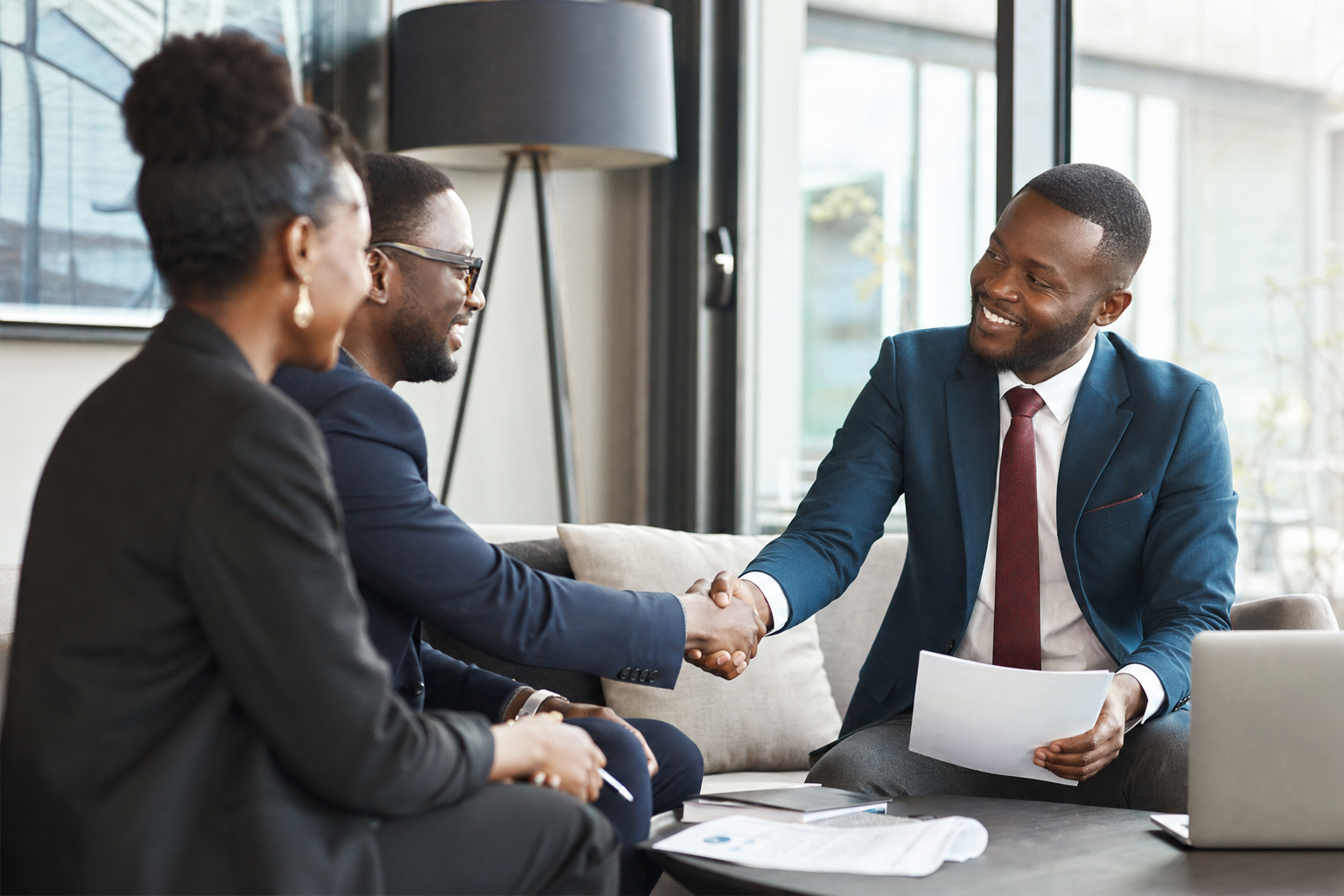 Black African business consultants in client meeting